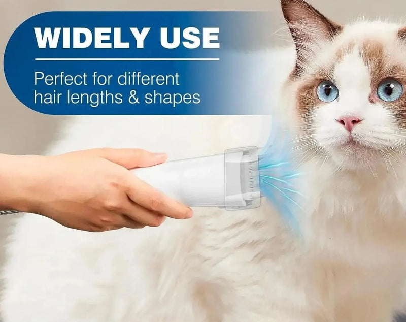 Professional Pet Grooming Vacuum used on a fluffy white and brown cat. The device efficiently removes loose fur while keeping pets calm with low noise.